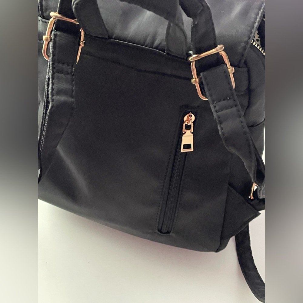 Medium size backpack with cheetah print lining - Picture 6 of 9